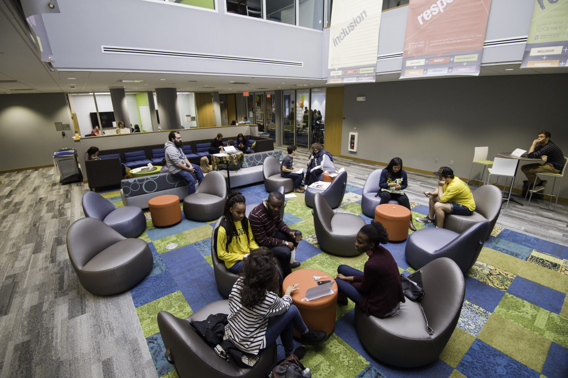 Aerial view of students gathering in Douglass Commons third floor lounge