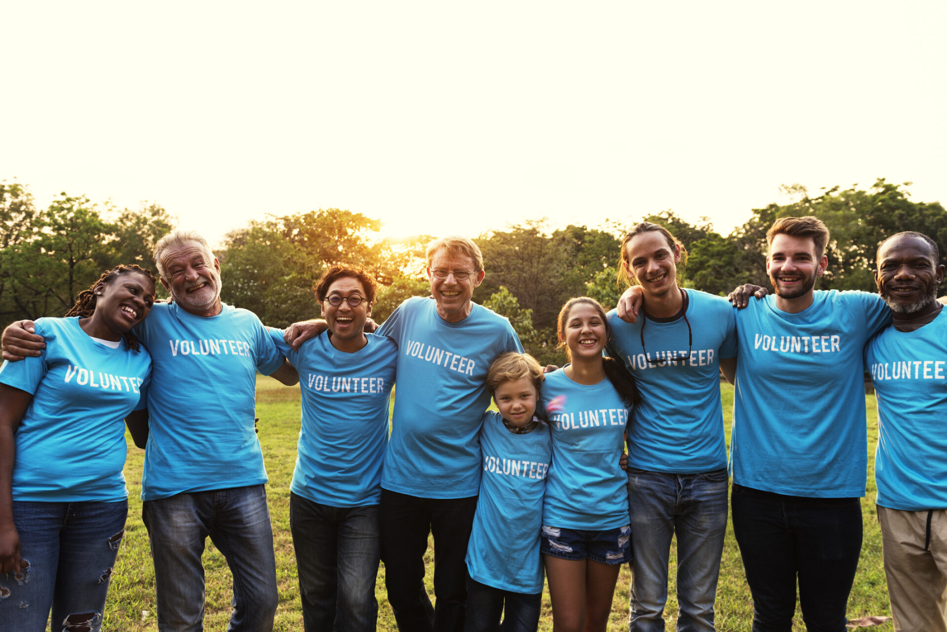 Volunteer group of people for charity donation in the park