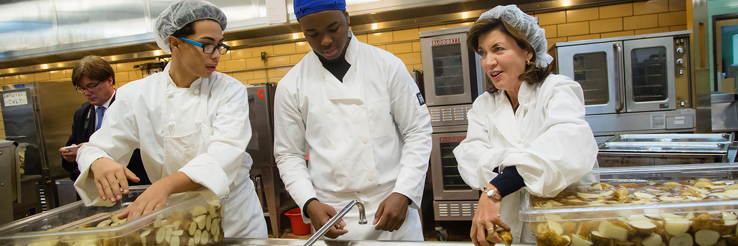 East students in culinary program preparing Thanksgiving with VIP guest