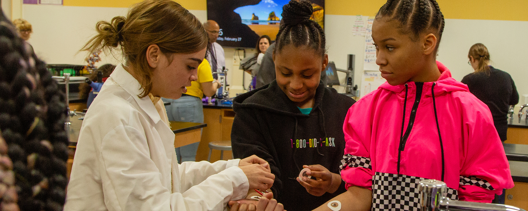 East CTE Open House 2020-115 three young women doing an experiment