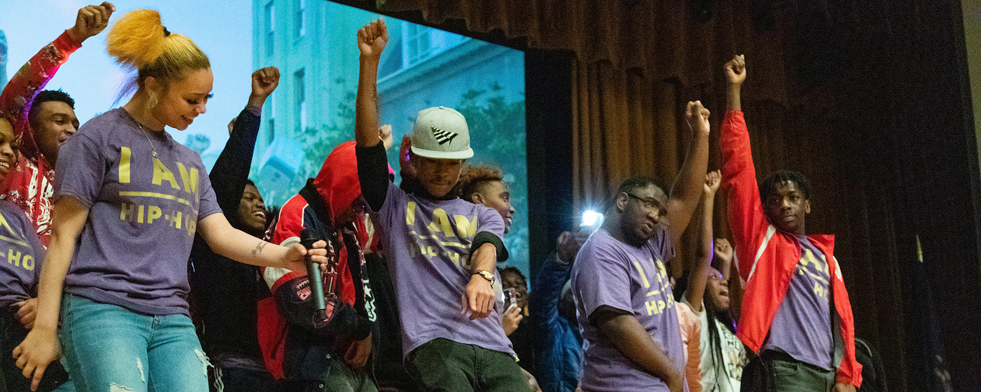 Students dancing in the finale of the hip hop literacy class final event