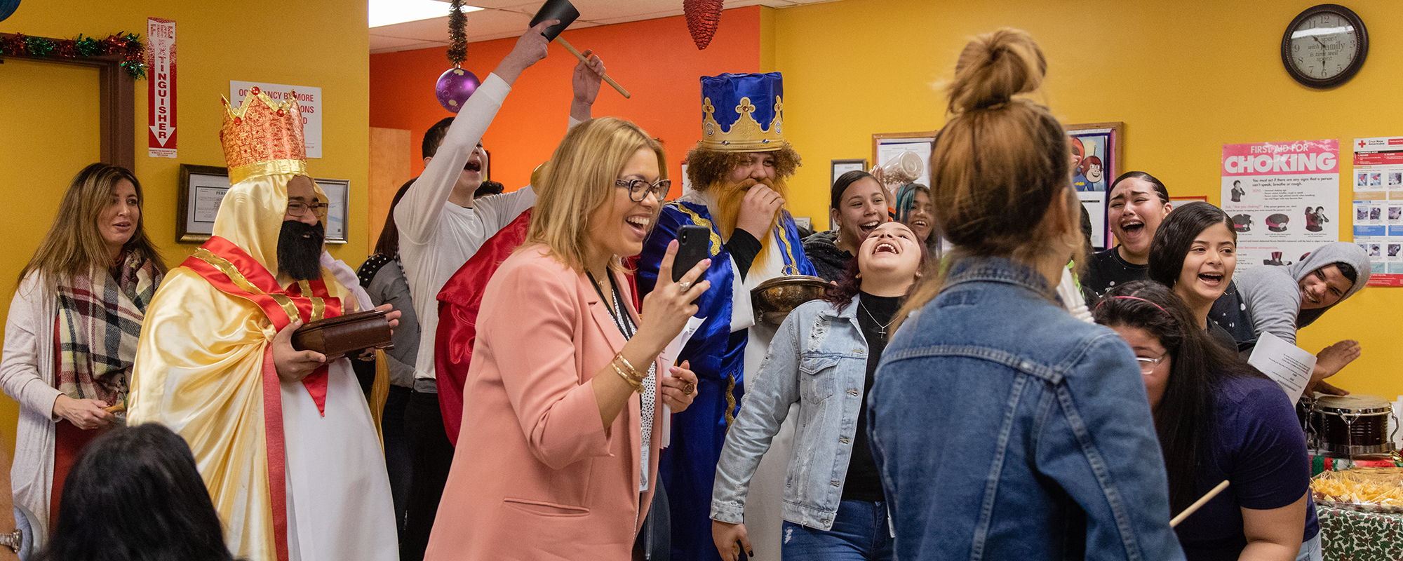 Latinx East administrators and students visit a community center