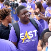 student with east t-shirt